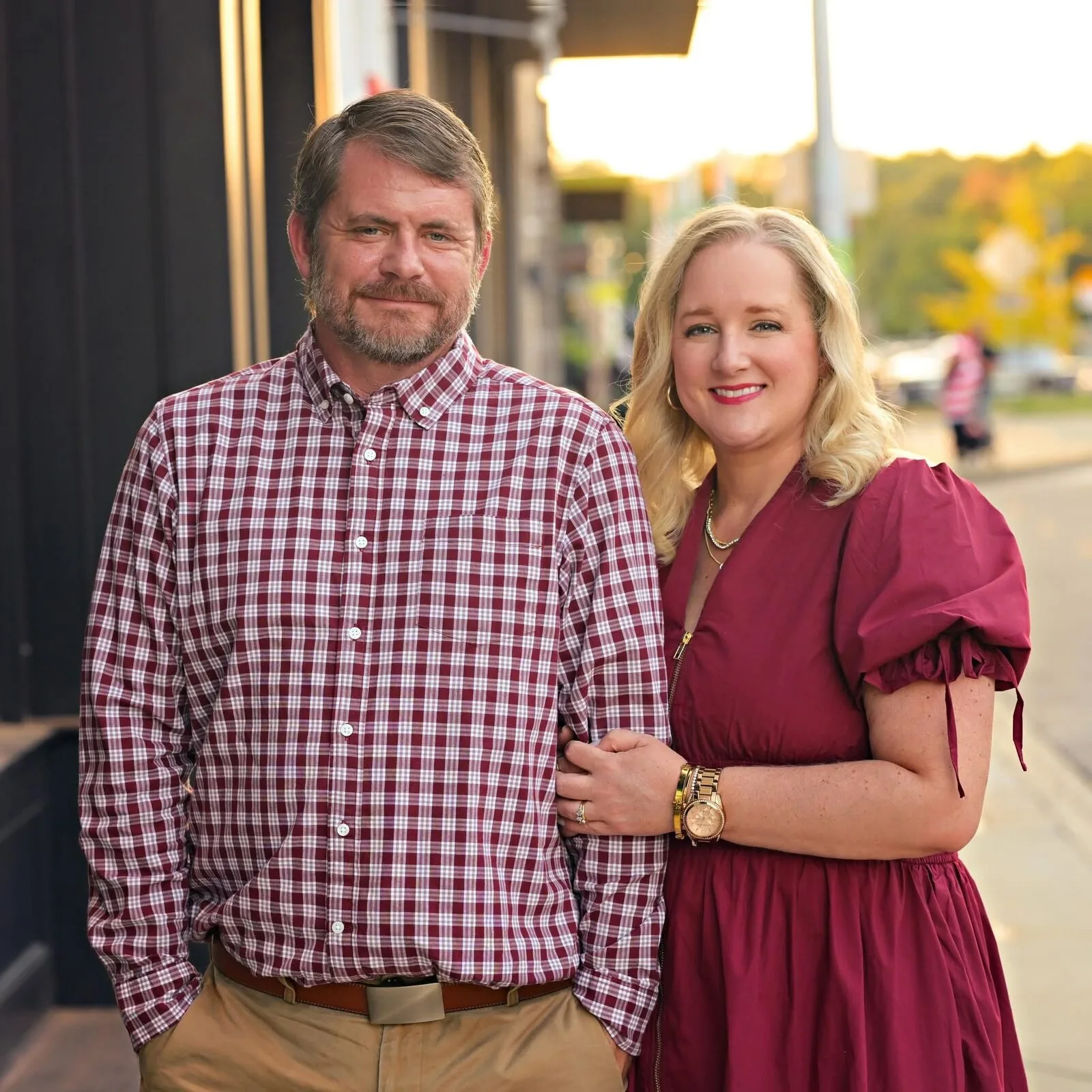 John and Rebecca Harber of PCS Builder, standing together in downtown Atoka, Tennessee