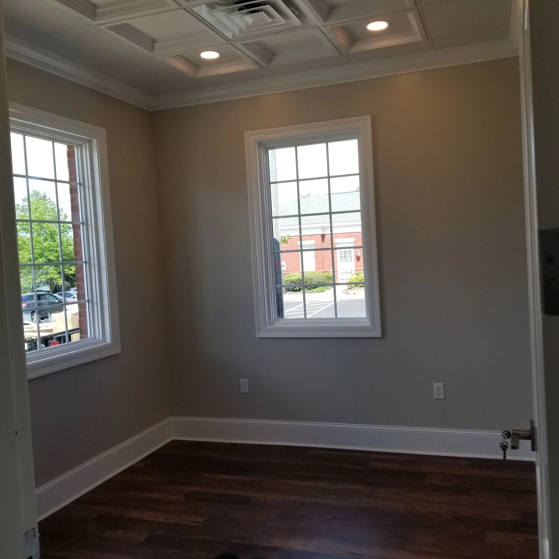 Interior view — paneled corridor and wood flooring
