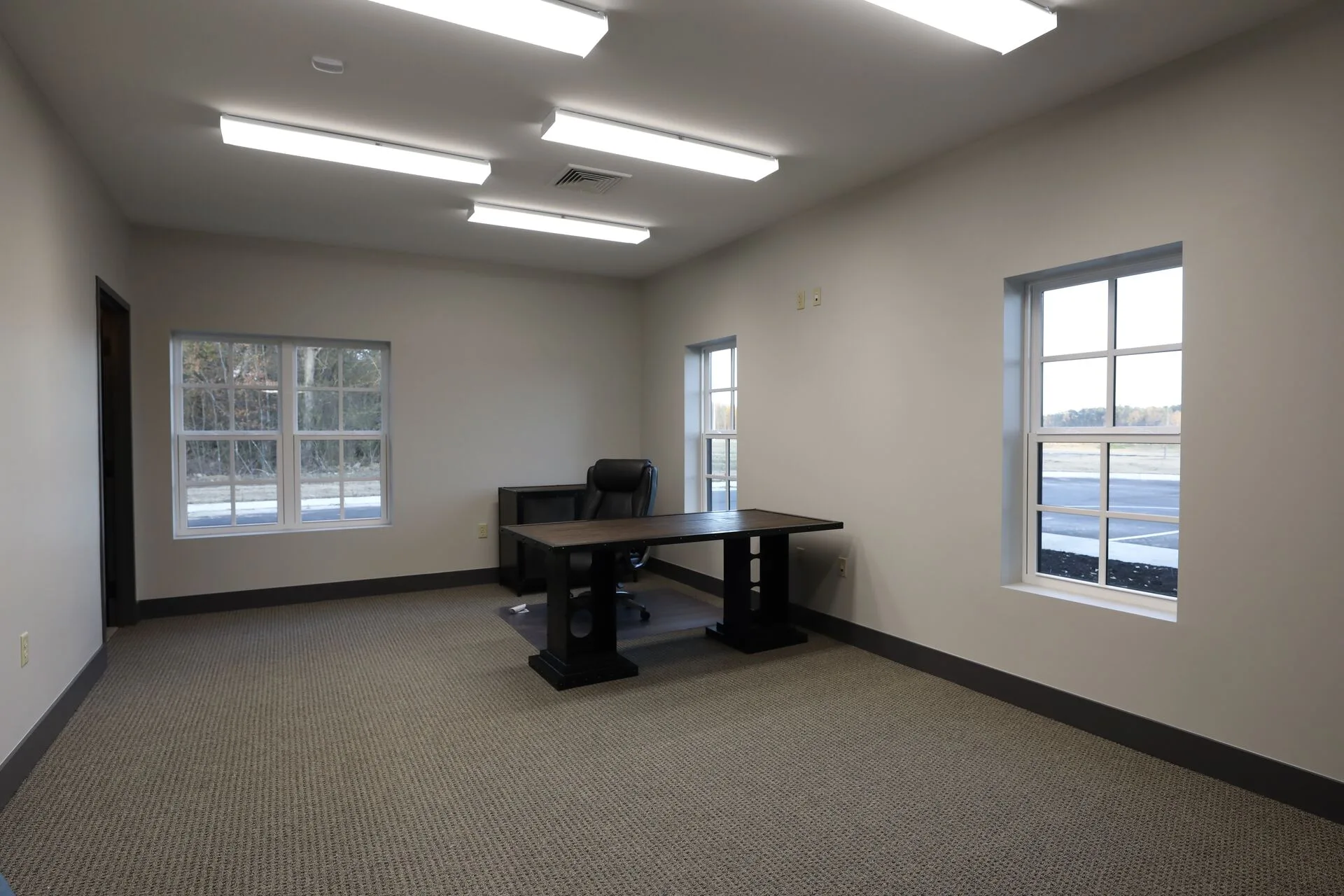 Private executive office with window views