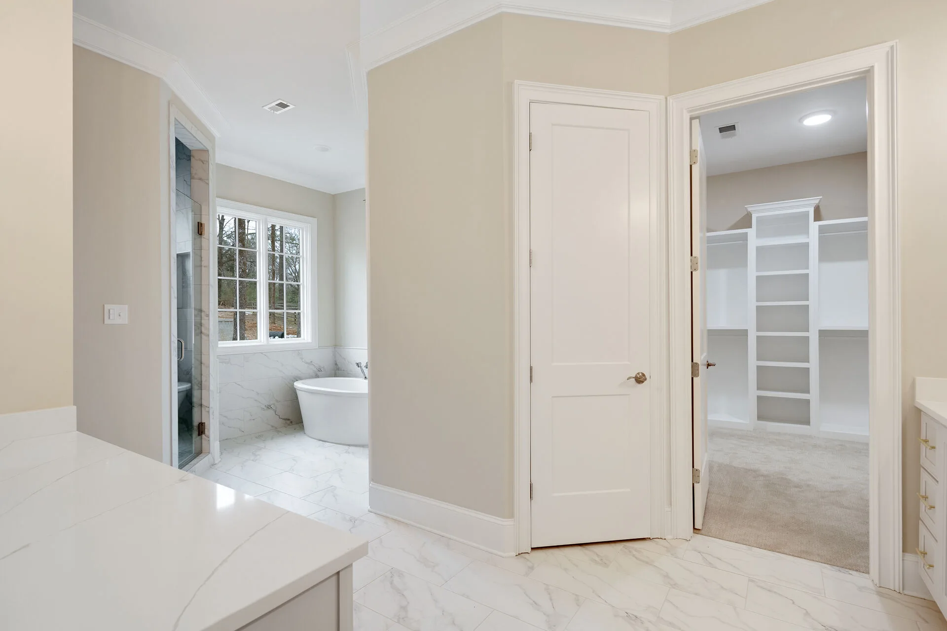 Living area with coffered ceiling and custom built-ins