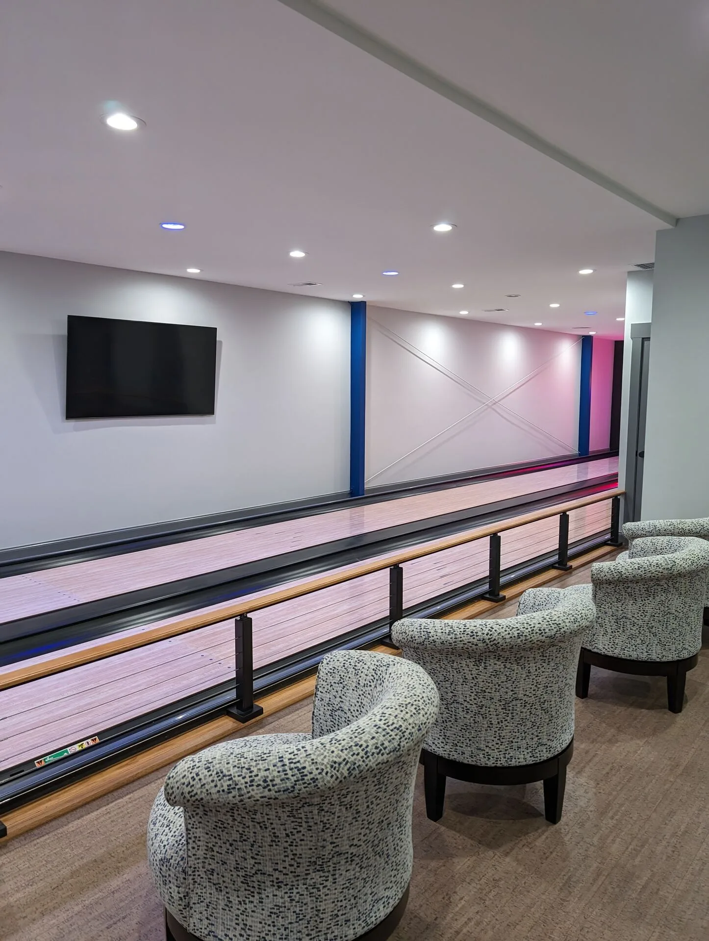 Bowling ball rack and scoring station